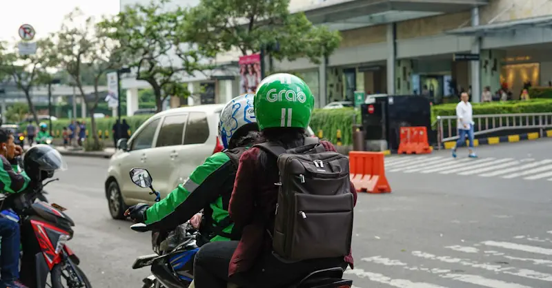 Delivery driver navigating through heavy traffic in the city